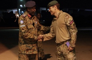 The Commanding Officer of 40 Commando shakes hands with Major General Tilal, the Sudanese commander at Wadi Seidna, prior to departing the airfield